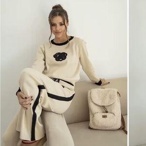 Chic Beige and Black Women's Pantsuit real black embellishment on top.